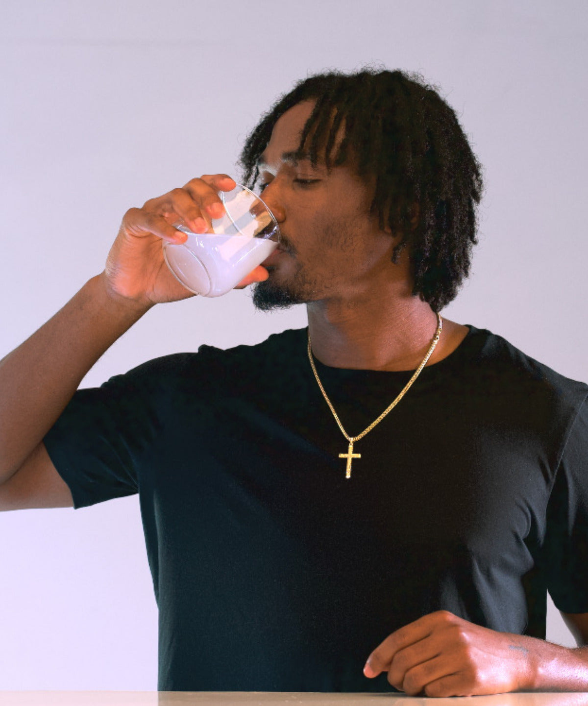 Tory Horton drinking a glass of Merivo Lemon Creatine